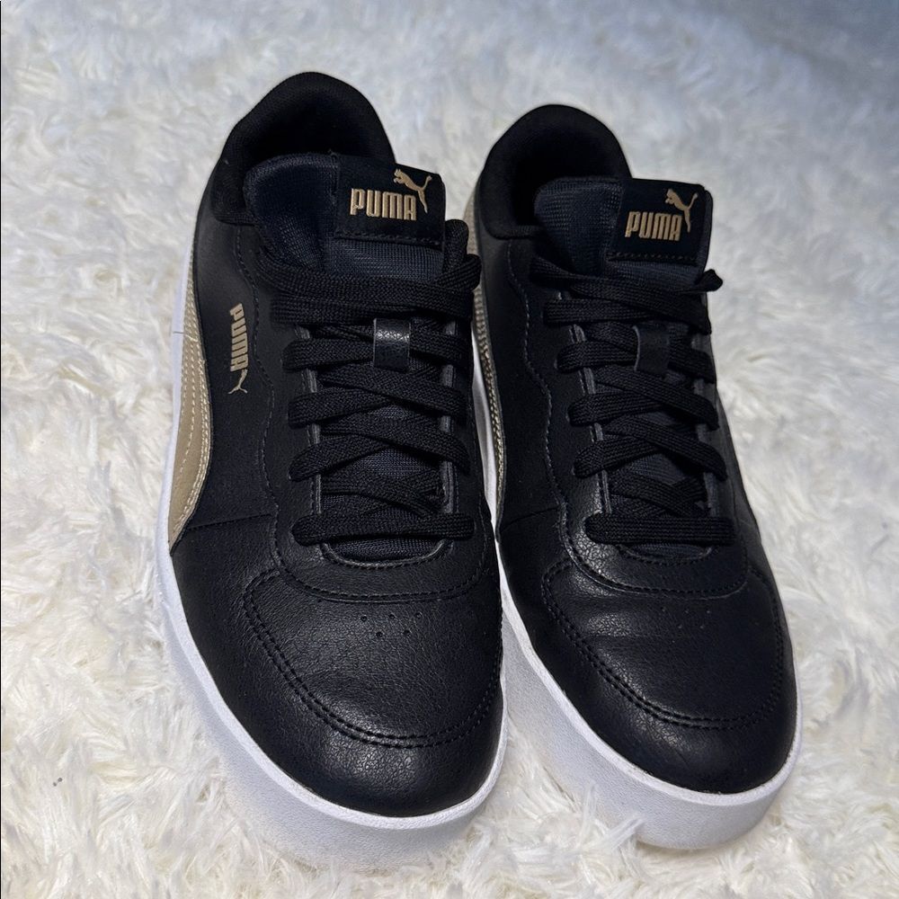 Puma Black Sneakers with Gold Highlights